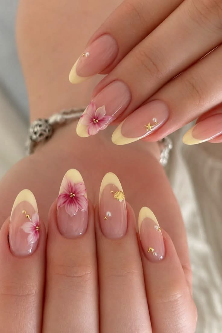 Fingers with delicate floral nail art